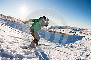 Snowboard freerider in the mountains