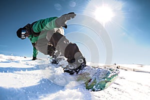 Snowboard freerider in the mountains