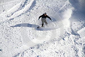 Snowboard freerider in the mountains