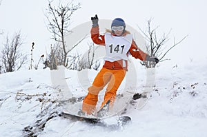 Snowboard girl downhill