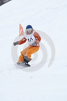 Snowboard girl in race