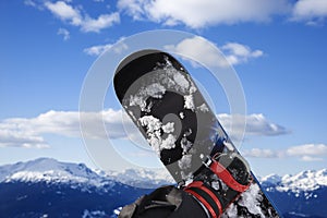 Snowboard and mountain.