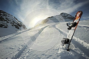 Snowboard in mountains