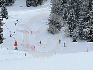 Snowboard and ski trails or alpine trails for winter sports above the tourist resort of Lenzerheide