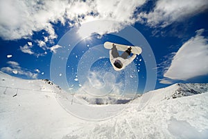 Snowboarder backflip