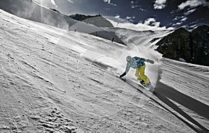 Snowboarder in a carved turn