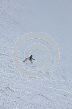 Snowboarder at free ride slope