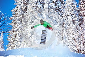 Snowboarder freeride jump powder snowboarding photo