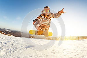 Snowboarder fun jump trick drop