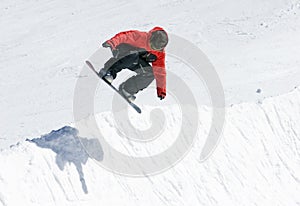 Snowboarder on half pipe of Pradollano ski resort in Spain photo