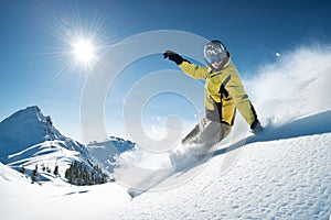 Snowboarder in high mountain