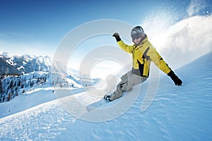 Snowboarder in high mountains