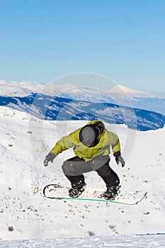 Snowboarder jumping