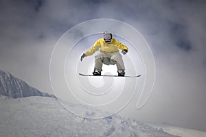 Snowboarder jumping