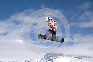 Snowboarder jumping