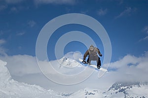 Snowboarder jumping