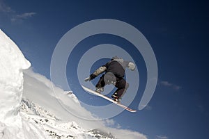 Snowboarder jumping