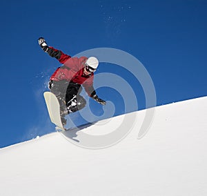 Snowboarder jumping