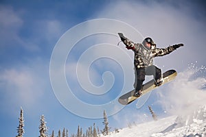 Snowboarder jumping