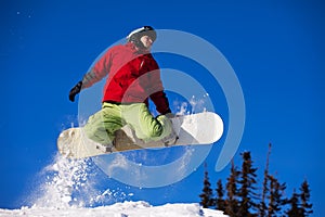 Snowboarder jumping