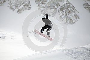 Snowboarder jumping