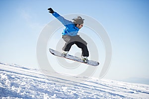 Snowboarder jumping