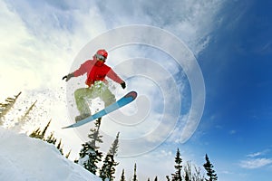 Snowboarder jumping