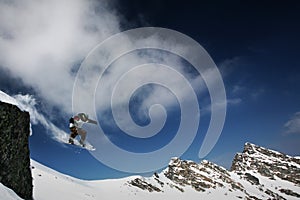 Snowboarder jumping