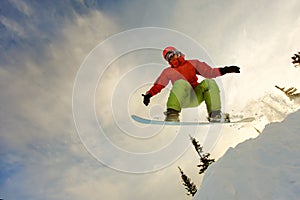 Snowboarder jumping