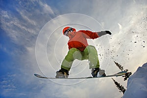 Snowboarder jumping