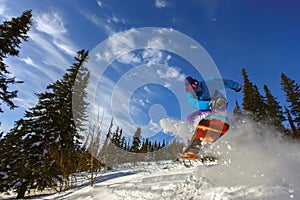 Snowboarder jumping