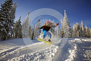 Snowboarder jumping