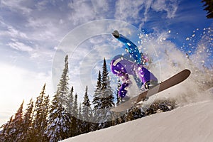 Snowboarder jumping