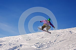 Snowboarder jumping