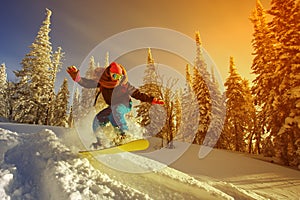 Snowboarder jumping