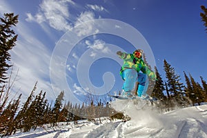 Snowboarder jumping