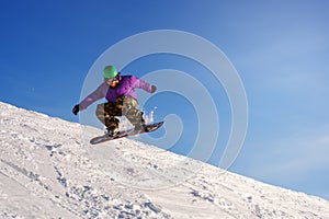 Snowboarder jumping