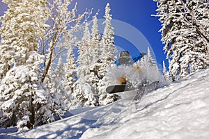 Snowboarder jumping