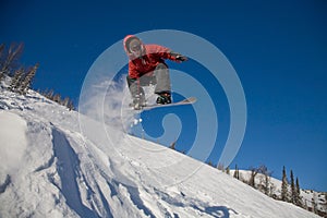 Snowboarder jumping