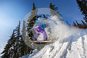 Snowboarder jumping