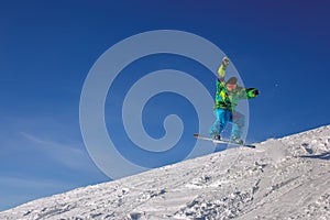 Snowboarder jumping