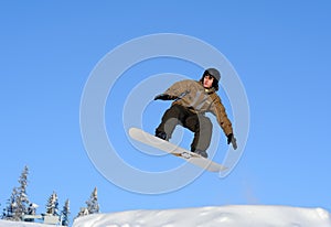 Snowboarder jumping