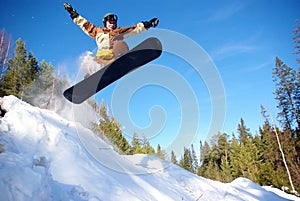 Snowboarder jumping