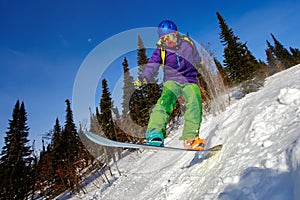 Snowboarder jumping