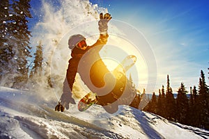 Snowboarder jumping