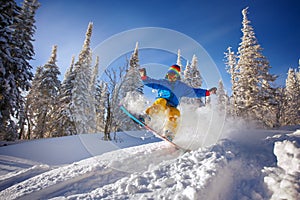 Snowboarder jumping