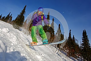 Snowboarder jumping