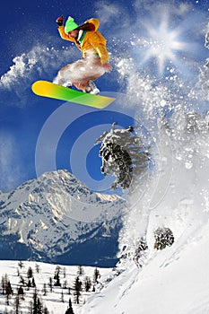 Snowboarder jumping against sun