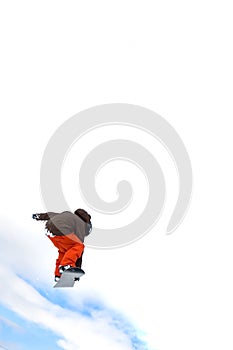 Snowboarder jumping high in the air