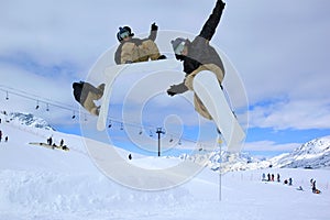 Snowboarder jumping high in the air